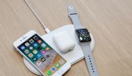 An AirPower wireless charger is displayed along with other products during an Apple launch event in Cupertino, California, U.S. September 12, 2017. REUTERS/Stephen Lam/File Photo