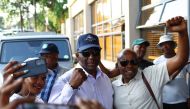 Sam Matekane, a millionaire diamond magnate and leader of Lesotho's Revolution For Prosperity (RFP), gestures before addressing his supporters following the Lesotho's parliamentary election in the capital Maseru, Lesotho, on October 8, 2022. REUTERS/Siphiwe Sibeko