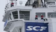 The logo of Russian state shipping company Sovcomflot is seen on the multifunctional icebreaking standby vessel 