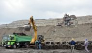 Workers are seen at a lignite mine, near the town of Obiliq, Kosovo, October 12, 2021. Reuters/Laura Hasani