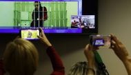 US basketball player Brittney Griner appears on a screen via video link from the detention centre during a court hearing to consider an appeal against her prison sentence, in Krasnogorsk, Moscow Region, Russia, October 25, 2022. (REUTERS/Evgenia Novozhenina)