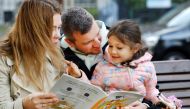 Ukrainian family Mykhalchenko read and listen to Better Time Stories, a project introduced for Ukrainian children who are seperated from their families in Rotterdam, Netherlands October 25, 2022. REUTERS/Piroschka van de Wouw