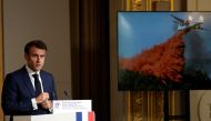 French President Emmanuel Macron delivers a speech in front of people involved in fighting wildfires last summer, at the Elysee Palace in Paris, France, October 28, 2022. Christophe Ena/Pool via REUTERS