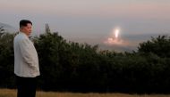 North Korea's leader Kim Jong-un oversees a missile launch at an undisclosed location in North Korea, in this undated photo released on October 10, 2022 by North Korea's Korean Central News Agency (KCNA). (KCNA via REUTERS)