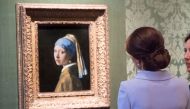 Britain's Kate, the Duchess of Cambridge views Girl with a Pearl Earring by Johannes Vermeer during a visit to the Mauritshuis in The Hague, Netherlands, on October 11, 2016.  File Photo / Reuters