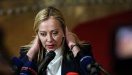 Newly appointed Italian Prime Minister Giorgia Meloni speaks to the press following a meeting at the European Council headquarters in Brussels on November 3, 2022. (AFP/Valeria Mongelli)