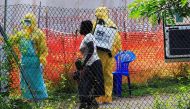 A woman and her child arrive for Ebola related investigation at the health facility at the Bwera General Hospital near the border with the Democratic Republic of Congo in Bwera, Uganda, on June 14, 2019.  File Photo / Reuters