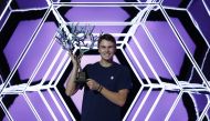 Denmark's Holger Rune celebrates with the trophy after winning the final against Serbia's Novak Djokovic Reuters/Christian Hartmann