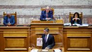 Greek Prime Minister Kyriakos Mitsotakis addresses lawmakers during a parliamentary session on a wiretapping case, in Athens, Greece, August 26, 2022. (REUTERS/Costas Baltas)