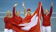 Switzerland's Belinda Bencic celebrates with her team after winning her match in the final against Australia's Ajla Tomljanovic at the Billie Jean King Cup Finals, Emirates Arena, Glasgow, Scotland, Britain, November 13, 2022. (REUTERS/Ed Sykes)