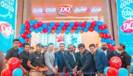 Dairy Queen officials inaugurate the opening of the outlet.     