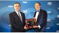 Founding Chairman of GORD Dr. Yousef Alhorr (left) receiving the award.