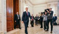 NATO Secretary General Jens Stoltenberg arrives for a press conference during a meeting of the NATO Ministers of Foreign Affairs, joined by the Ministers of Foreign Affairs of Finland, Sweden and Ukraine, as well as the EU High Representative for Foreign Affairs and Security Policy, at the Palace of the Parliament of Romania in Bucharest, on November 30, 2022. (Photo by Andrei Pungovschi / AFP)
 
