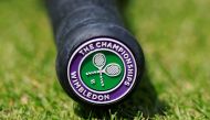 General view of the Wimbledon logo on the base of the handle of a tennis racquet at the All England Lawn Tennis and Croquet Club, London, Britain, on July 2, 2019.  File Photo / Reuters
