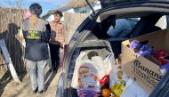 Romanian coast guard deliver Christmas presents to villagers at an unspecified location, along the Danube delta, Romania December 20, 2022. REUTERS/Anca Cernat NO RESALES. NO ARCHIVES.