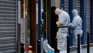 French scientific police work on Rue d'Enghien after gunshots were fired, killing and injuring several people, in a central district of Paris, France, on December 23, 2022. REUTERS/Sarah Meyssonnier/File Photo
