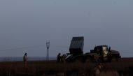 Ukrainian servicemen prepare BM-21 Grad multiple rocket launcher to fire, as Russia's attack on Ukraine continues, during intense shelling on Christmas Day at the frontline in Bakhmut, Ukraine, December 25, 2022. Reuters/Clodagh Kilcoyne