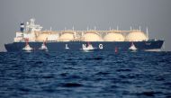 File Photo: A liquefied natural gas (LNG) tanker is tugged towards a thermal power station in Futtsu, east of Tokyo, Japan, November 13, 2017. (REUTERS/Issei Kato)