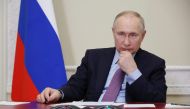 Russian President Vladimir Putin attends a ceremony to launch the Titan-Polymer industrial complex in Pskov region, via a video conference in Staint Petersburg on December 28, 2022. (Photo by Mikhail Klimentyev / SPUTNIK / AFP) 
