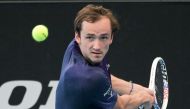 Russia's Daniil Medvedev hits a return against Russia's Karen Khachanov during their men's singles quarter-final match at the Adelaide International tennis tournament in Adelaide on January 6, 2023. Photo by Brenton EDWARDS / AFP