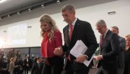 Presidential candidate and former Czech Prime Minister Andrej Babis and his wife Monika Babisova leave following a press conference after the 1st round of the presidential election on January 14, 2023 in Prague. (Photo by Milan Kammermayer / AFP)