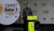 Nigerian President Muhammadu Buhari gives a speech as he attends the Dakar summit under the theme 