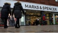 Shoppers walk past a branch of Marks and Spencer in Altrincham, Britain on January 7 2020. File Photo / Reuters
