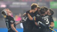 German players celebrate after scoring the winning goal during the men's semi-final match between Australia and Germany at the FIH Odisha Field hockey Men's World Cup 2023, in Bhubaneswar on January 27, 2023. (Photo by Dibyangshu Sarkar / AFP)