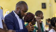 Faithfuls pray inside the Emmanuel-Butsili Catholic Parish in Beni, Democratic Republic of Congo, January 25, 2023. REUTERS/Erikas Mwisi Kambale
