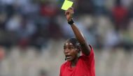 Mukansanga was the first woman from Rwanda to referee at the FIFA Women’s World Cup and the AFCON [Mohamed Abd El Ghany/Reuters]
