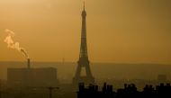 A general view shows the Eiffel Tower and vapour that billows from smokestacks in Paris skyline, in Paris, France, December 9, 2022. (REUTERS/Gonzalo Fuentes)

