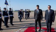 Prime Minister of Morocco Aziz Akhannouch (right) receives Spanish Prime Minister Pedro Sanchez upon his arrival in Rabat, on February 1, 2023. (Photo by AFP)