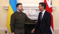 Britain's Prime Minister Rishi Sunak (right) talks with Ukraine's President Volodymyr Zelensky during their meeting inside 10 Downing Street in central London on February 8, 2023. (Photo by Dan Kitwood / POOL / AFP)
