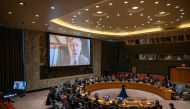 British musician Roger Waters is displayed on a screen during an address to a UN Security Council meeting on Ukraine, at UN headquarters in New York on February 8, 2023. (Photo by Ed Jones / AFP)