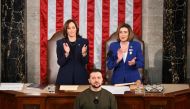 In this file photo taken on December 22, 2022 Ukraine's President Volodymyr Zelensky addresses the US Congress as US Vice President Kamala Harris (left) and US House Speaker Nancy Pelosi  applaud at the US Capitol in Washington, DC. (Photo by Jim WATSON / AFP)
