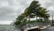 This image shows the fishing village of Mahebourg, Mauritius, on February 20, 2023 as Cyclone Freddy approaches. - The Mauritius Meteorological Services (MMS) has issued a Class 3 cyclone warning, saying estimated gusts in the centre of Cyclone Freddy could reach around 275 kilometres (170 miles) an hour. (Photo by Laura MOROSOLI / AFP)