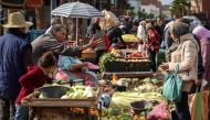 In this picture taken on February 23, 2023, shoppers buy fresh produce at the Sidi Moussa market in Morocco's Atlantic coastal city of Sale, north of the capital. Photo by FADEL SENNA / AFP)