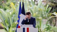 French President Emmanuel Macron delivers his speech to the French community at the residence of the French Ambassador in Libreveille on March 2, 2023. (Photo by LUDOVIC MARIN / AFP)