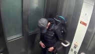 In this file photo taken on May 22, 2017 A handout photo released by the Manchester Arena Inquiry in Manchester, northern England on September 8, 2020, shows suicide bomber Salman Abedi carrying a rucksack in the lift at Victoria Station in Manchester.  (Photo by Manchester Arena Inquiry / AFP)
