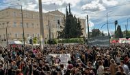 Protesters gather in front of the Greek parliament in Athens on March 5, 2023 during a demonstration following the deadly train accident late on February 28. (Photo by Louisa Gouliamaki / AFP)