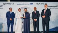 Abdullah Abdulghani & Bros. Co. (AAB) officials present a token of appreciation to a customer.