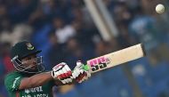 Bangladesh's Najmul Hossain Shanto plays a shot during the first Twenty20 international cricket match between Bangladesh and England at the Zahur Ahmed Chowdhury Stadium in Chittagong on March 9, 2023. (Photo by Munir uz ZAMAN / AFP)