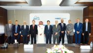 Qatar Gas Transport Company and HSD Engine officials at the signing ceremony.