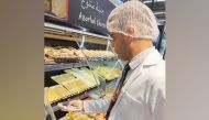 MInistry official inspecting the quality at a supermarket 