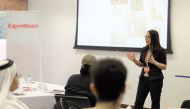 An official from ExxonMobil making her presentation.