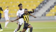 Qatar SC and CS Sfaxien players in action at Suheim Bin Hamad Stadium.  