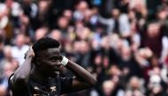 Arsenal's English midfielder Bukayo Saka reacts after missing to score a penalty kick during the English Premier League football match between West Ham United and Arsenal at the London Stadium, in London on April 16, 2023. (Photo by Ben Stansall / AFP)