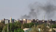 In this picture taken on May 7, 2023, smoke billows in Khartoum amid ongoing fighting between the forces of two rival generals. (Photo by AFP)

