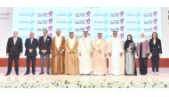 Minister of Labour H E Dr. Ali bin Smaikh Al Marri (centre), Minister of Justice H E Masoud bin Mohammed Al Amri (fourth right), and other ministers and dignitaries at the opening ceremony of the forum in Doha yesterday. 