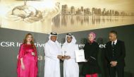 Shell’s NXplorers officials receiving the award during Qatar CSR Summit 2023. 